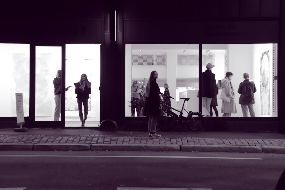 Team of boutique advisors standing together in showroom