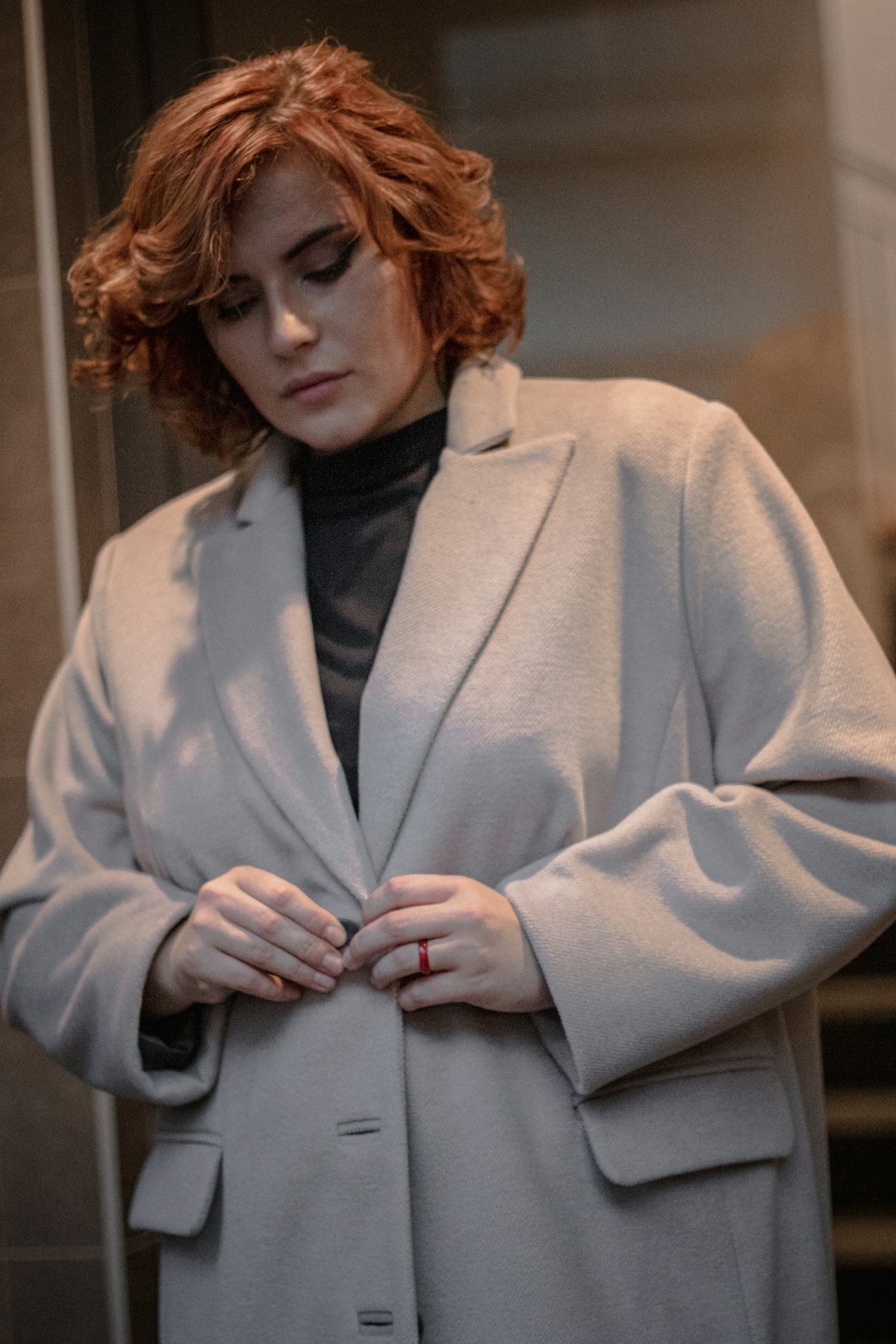 woman wearing luxury coat